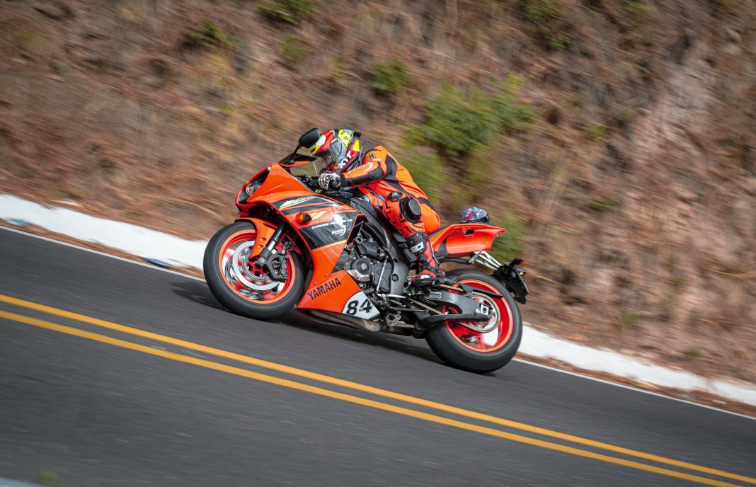 a man riding a motorcycle