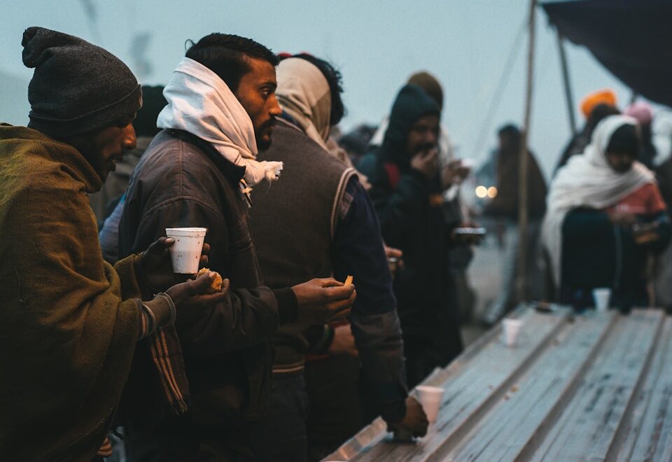 a group of people standing next to each other