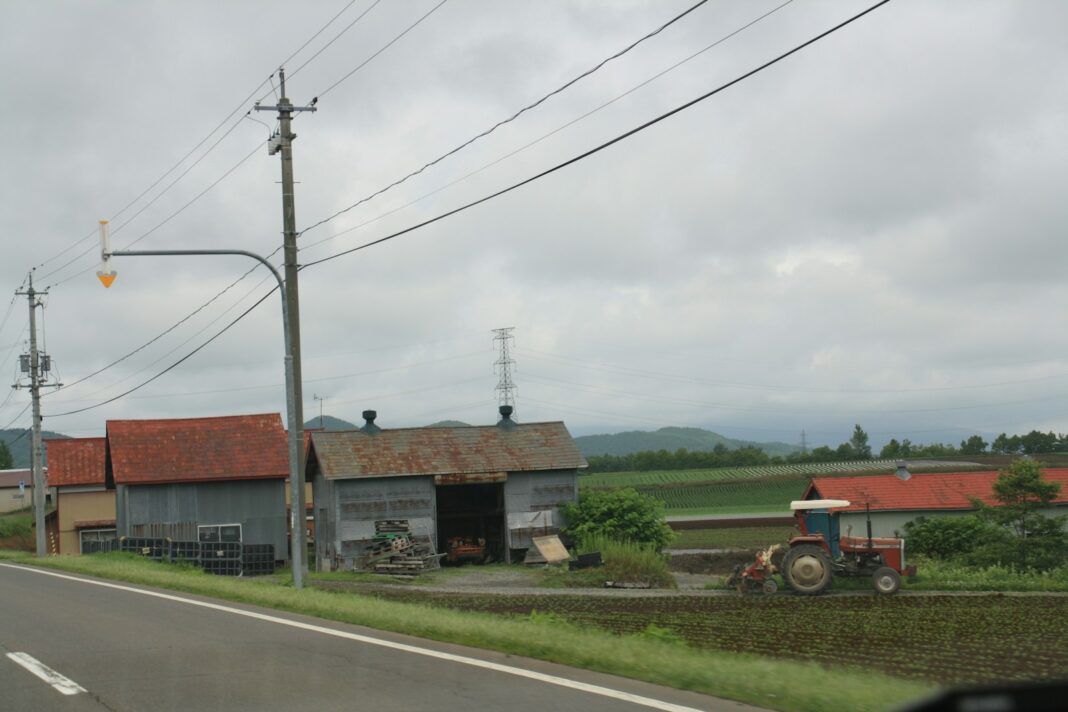a tractor parked outside a building