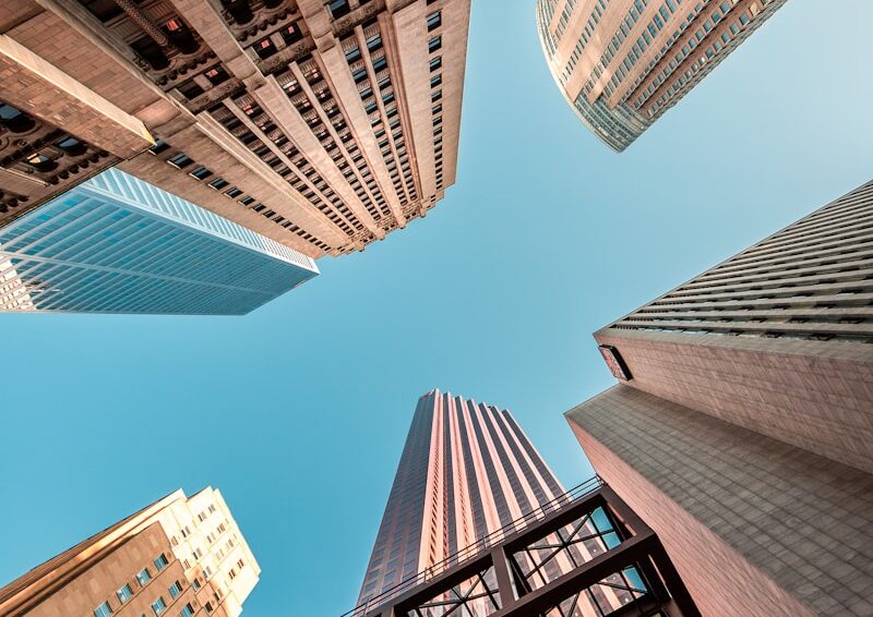 wormseye view of high-rise buildings under blue sky