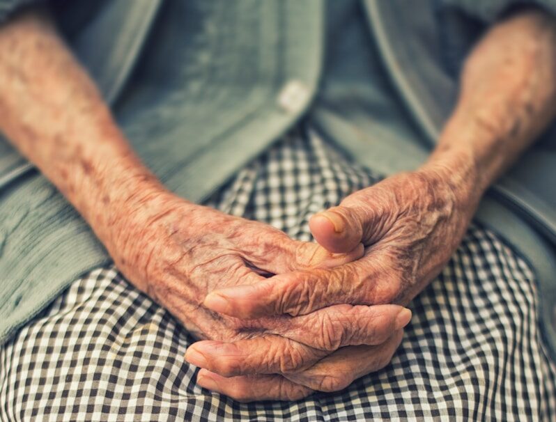 person's hand in shallow focus