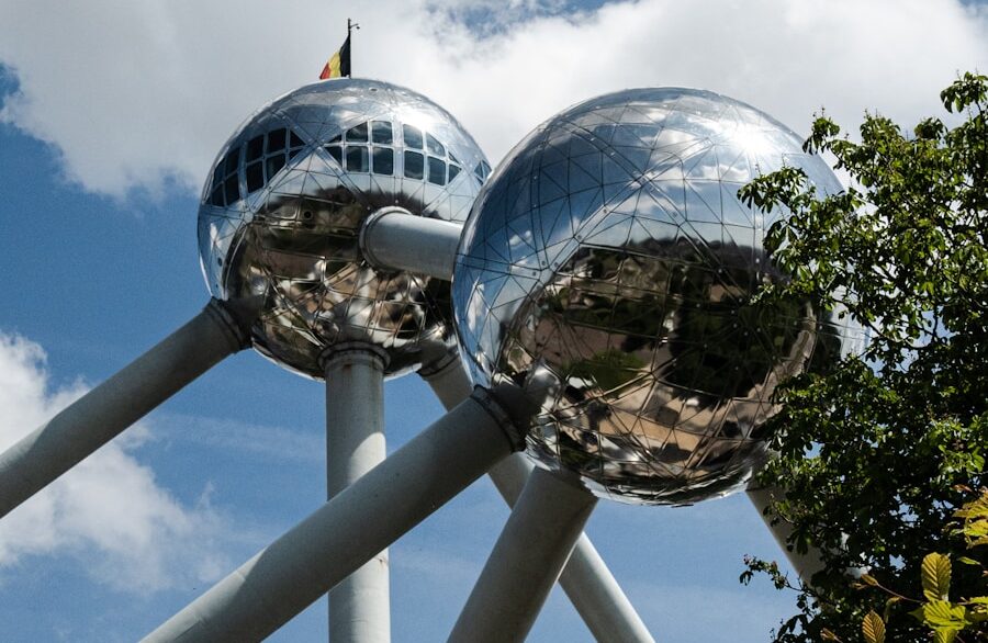 a large metal structure with mirrored balls on top of it