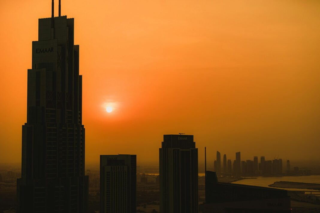 a city skyline at sunset