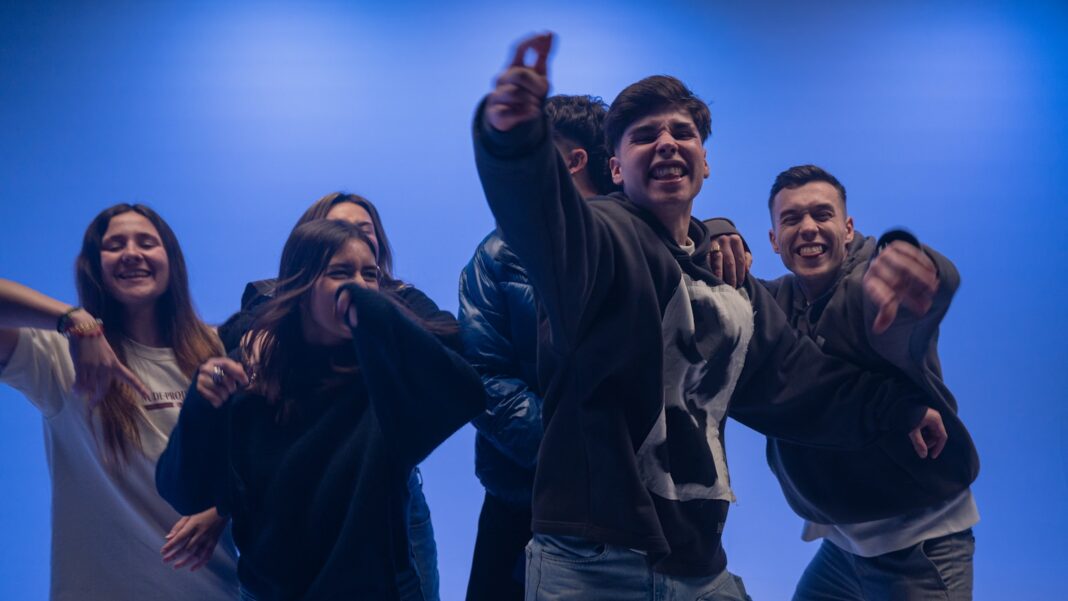A group of people standing next to each other