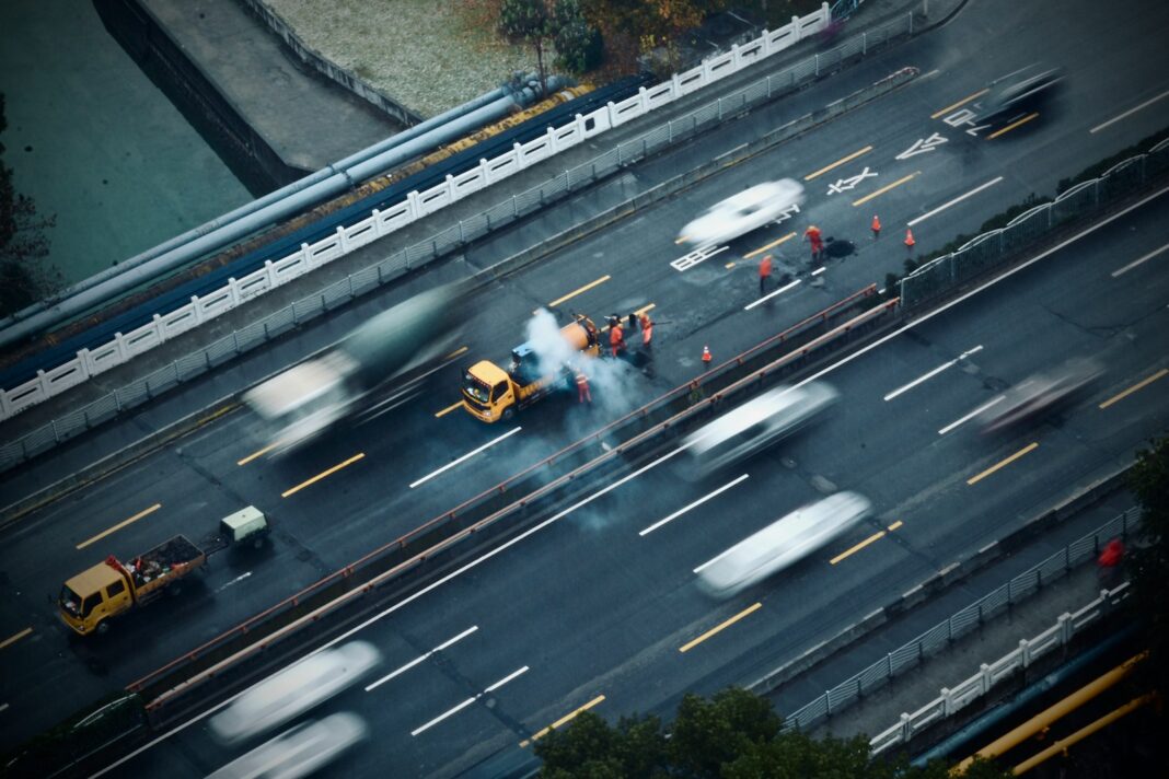 aerial view of truck broken at the middle of the street