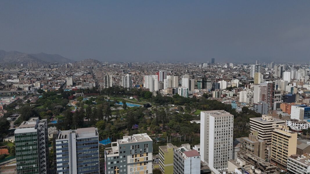 A view of a city from the top of a building